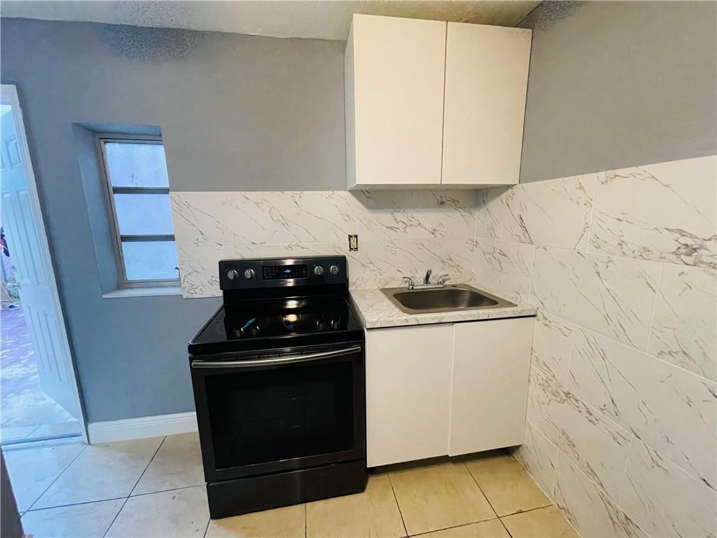 Welcome to an inviting all inclusive 1 bedroom, 1 bathroom efficiency available for rent in the vibrant city of Miami Gardens. This cozy and well-maintained unit is perfect for individuals seeking a comfortable and affordable living space. Located in a picturesque neighborhood, this efficiency offers a tranquil and serene environment for residents to enjoy. Pet friendly. Water and electric included! Easy to apply and quick approval.