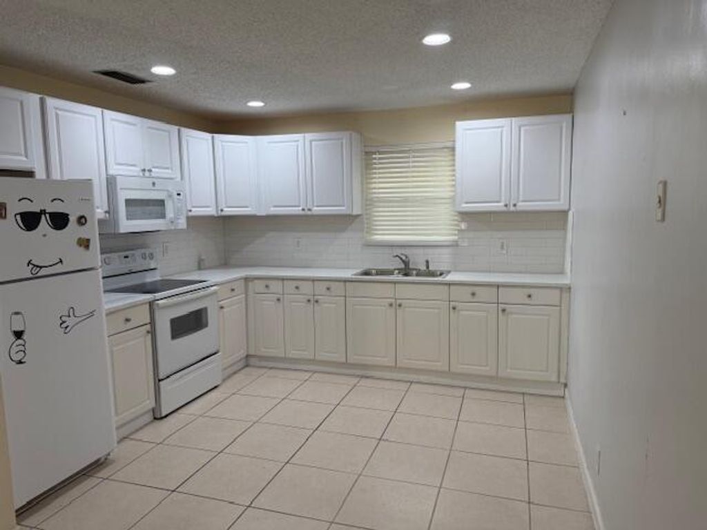 Photo of 2416 Sunset Drive, West Palm Beach, FL 33415 (MLS # R11168983)