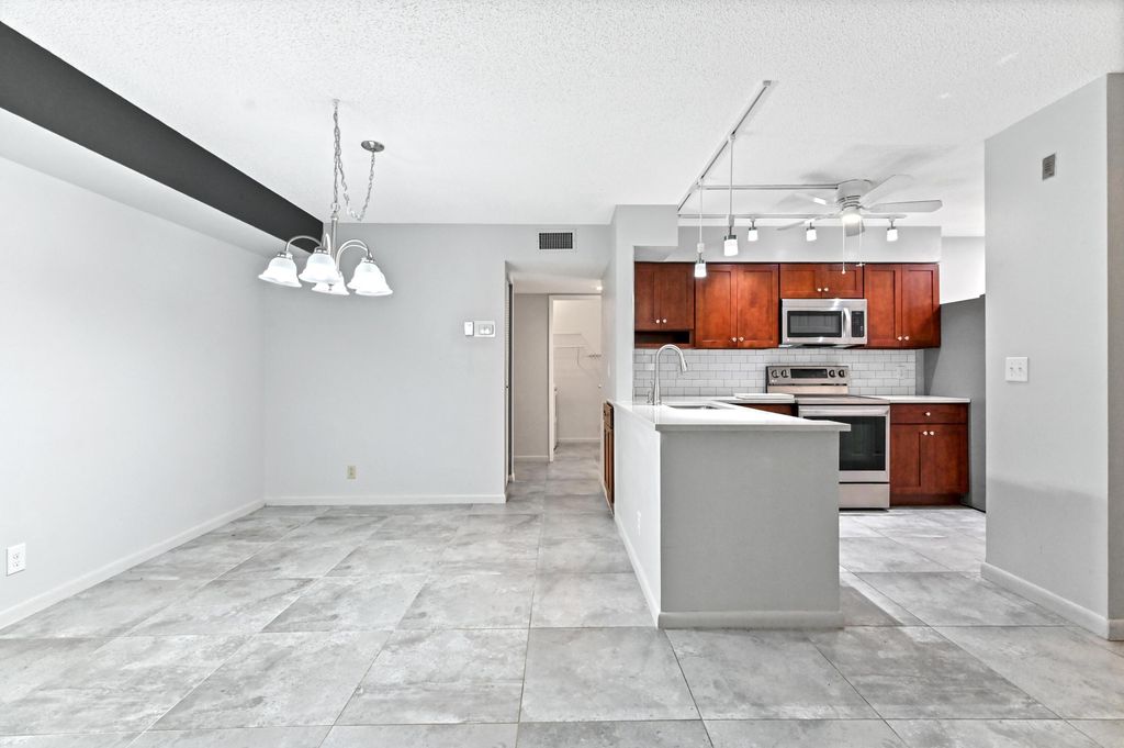 Photo of 14895 Builtmore Way #107, Delray Beach, FL 33446 (MLS # R11156951)