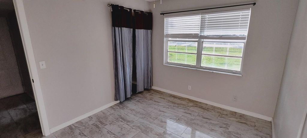 Photo of 1562 SE Royal Green Circle #103, Port Saint Lucie, FL 34953 (MLS # R11081930)