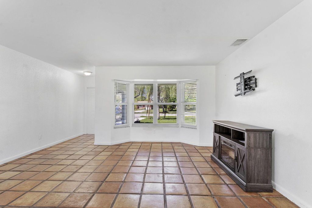 Photo of 1974 SE Tiffany Avenue, Port Saint Lucie, FL 34952 (MLS # R11132531)