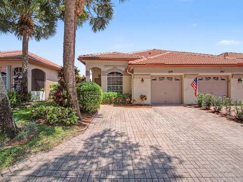 Photo of 1019 Via Jardin, Riviera Beach, FL 33418 (MLS # B26055504)