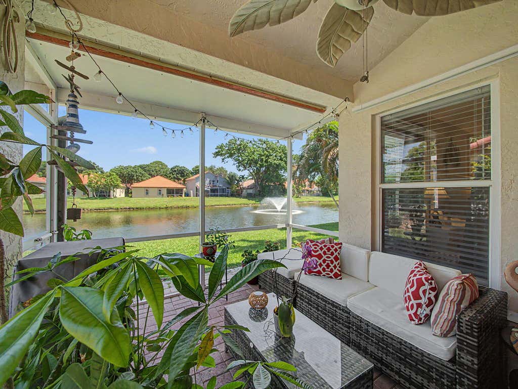 Photo of 1019 Via Jardin, Riviera Beach, FL 33418 (MLS # B26055504)