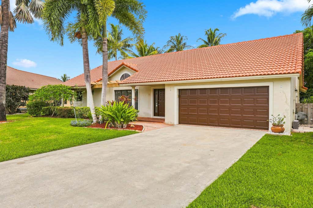 Photo of 10798 CYPRESS BEND Drive, Boca Raton, FL 33498 (MLS # B26068843)