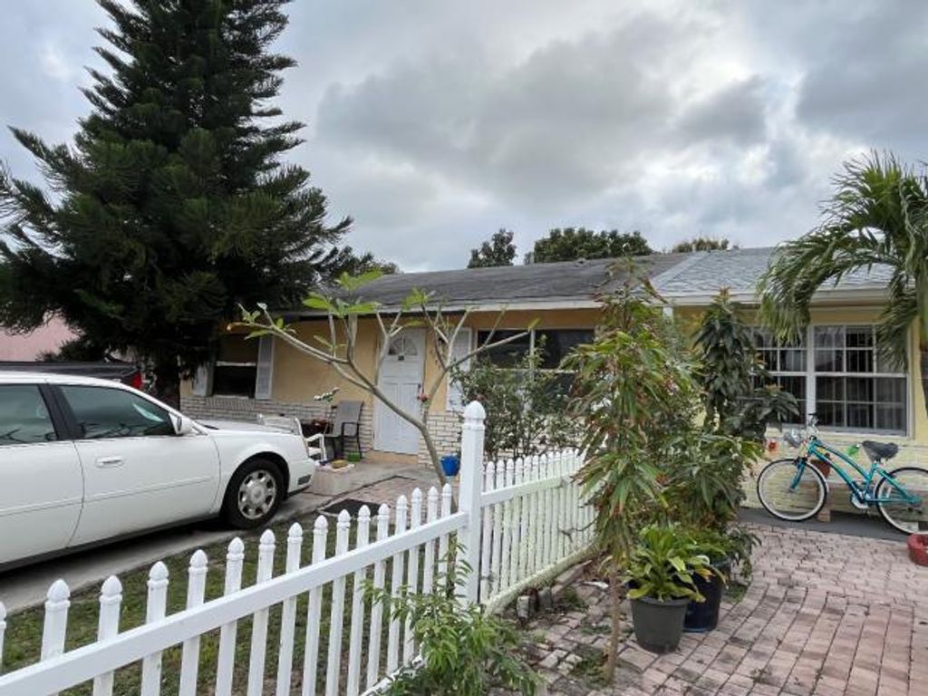 Photo of 4799 Saratoga Road, West Palm Beach, FL 33415 (MLS # R10979589)