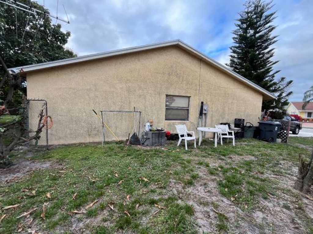 Photo of 4799 Saratoga Road, West Palm Beach, FL 33415 (MLS # R10979589)