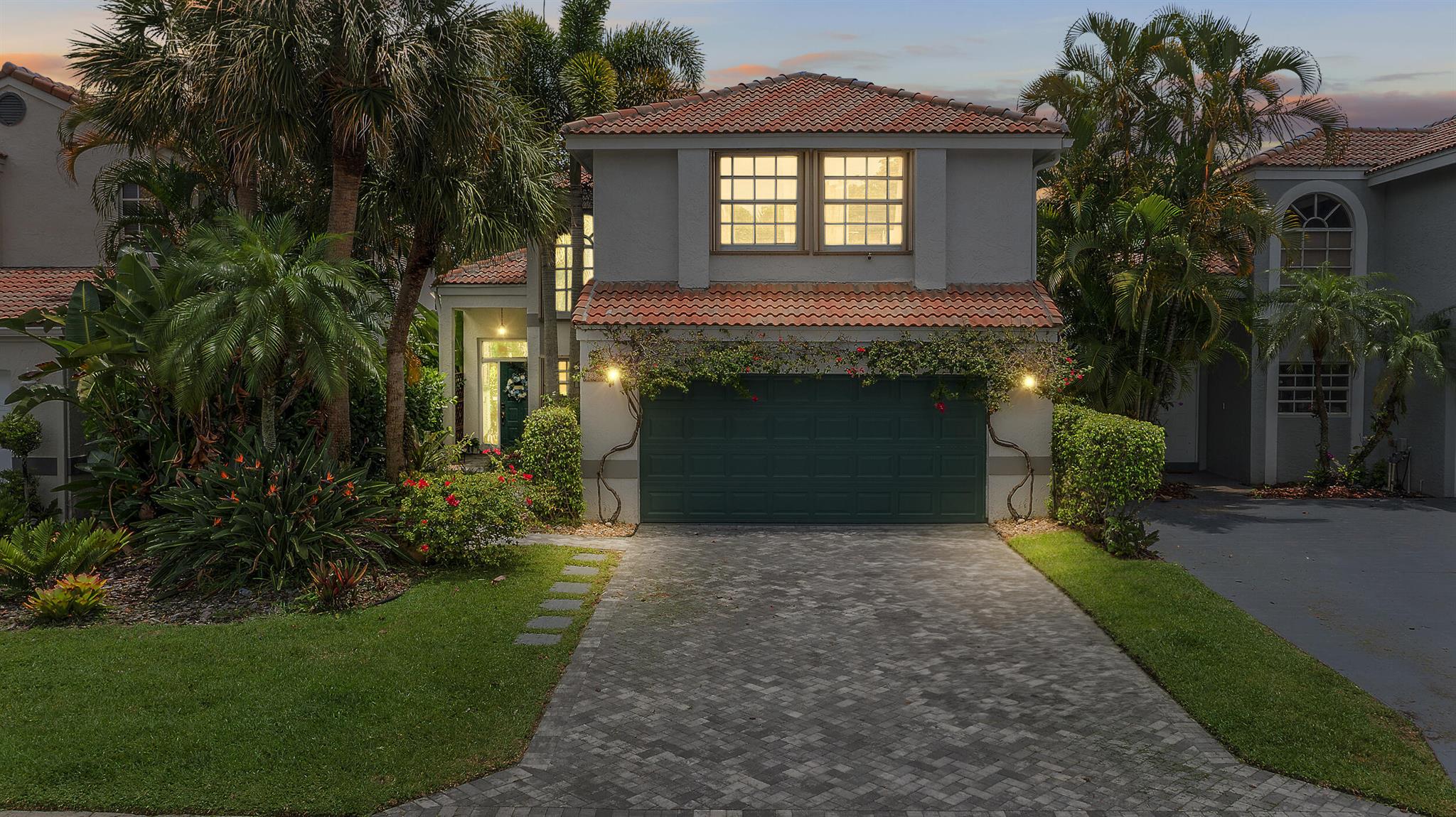 Welcome to this beautifully Lakefront Home 4-bedroom, 2.5-bath residence, enjoy your own private tropical oasis with a resort-style pool, jacuzzi, serene Lake views. With classic charm and thoughtful renovations throughout, this inviting home offers a warm and refined living experience. From the moment you enter, you're greeted by graceful vaulted ceilings that enhance the spacious living room, filling it with natural light and a sense of openness. Kitchen is a Masterpiece of custom design, modern appliances, Custom cabinetry, crown molding, Lighting perfectly balancing function and sophistication. Located near A-rated schools, shopping Boca Town Center, beautiful beaches, dining. *Sellers offering a Credit of $30,000 for Buyer closing costs. Call Agent for more info and private​​‌​​​​‌​‌​​​‌‌​​​‌‌‌​​‌​​‌‌​​​​ showings!