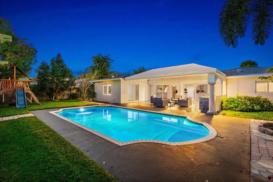 BEAUTIFUL and highly sought after 4 Bedroom 3 Full Bath POOL home in Tequesta Country Club checks off ALL the boxes and more! Nestled on one of the most desirable tree lined streets and located in one of the BEST neighborhoods in Tequesta this recently RENOVATED, CBS home with NO mandatory HOA is overflowing with upgrades! Boasting a BRAND NEW ROOF (2022) BRAND NEW IMPACT Windows and Sliders (2022) and a BRAND NEW Pool pump and newer AC (2018)! Your STUNNING home also features the perfect balance of Indoor/Outdoor living and an OVERSIZED backyard with ample green space, room for a boat/RV, shed for extra storage, summer kitchen and a SPARKLING blue pool! 

335 Country Club Drive will have you SWOONING from the moment you drive down the beautiful tree lined street and pull into the sprawling, circular driveway, where your newly painted home is surrounded by lush Florida landscaping. As you step inside, you are greeted by a completely OPEN floor plan with new Wood-look ceramic tile throughout the entire house making the space seamless and durable.

The OPEN kitchen features high end stainless steel appliances, white cabinetry, center island, AMPLE storage space, and a wine rack to hold your favorite bottle of red! It is completely open to your main living area and EXPANSIVE dining room with enough space to create a second living space or additional sitting area. The main living area overlooks brand NEW floor to ceiling IMPACT sliders looking out to a large covered back PATIO with views of your sparkling blue pool! 

This split floor plan includes TWO spacious bedrooms that can be used as the Primary! One of the bedrooms complete with an ensuite is tucked away in a PRIVATE corner off of the dining space, the other also complete with an ensuite and walk-in closet is off of the living room. Making your way to the other side of the house are two additional bedrooms one of which includes sliders leading out to the backyard and a full bath for guests. A laundry room leading out the 1 car garage with Golf Cart completes that side of the house. 

The large backyard and patio is the PERFECT place to entertain and enjoy the pool complete with a summer kitchen area, large patio awning and plenty of space for a playset or garden. In the rear corner of the property you'll enjoy a multi-functional storage shed equipped with electrical that could function as a workout space, office or workshop. On the East side of the property lot there is a wide side yard perfect for storing a BOAT, jet skis or other recreational vehicles. The front of the home boasts a very large circular driveway with plenty of space for guests. 

Tequesta Country Club is a family friendly golf course community with a voluntary HOA that gives you access to the community boat ramp and dock. Membership to the club is not mandatory and is available on a limited basis. Close to A-rated schools, some of the best restaurants in Jupiter and pristine Jupiter beaches and golf courses, Tequesta has so much to offer while still maintaining the charm and character that so many residents enjoy!