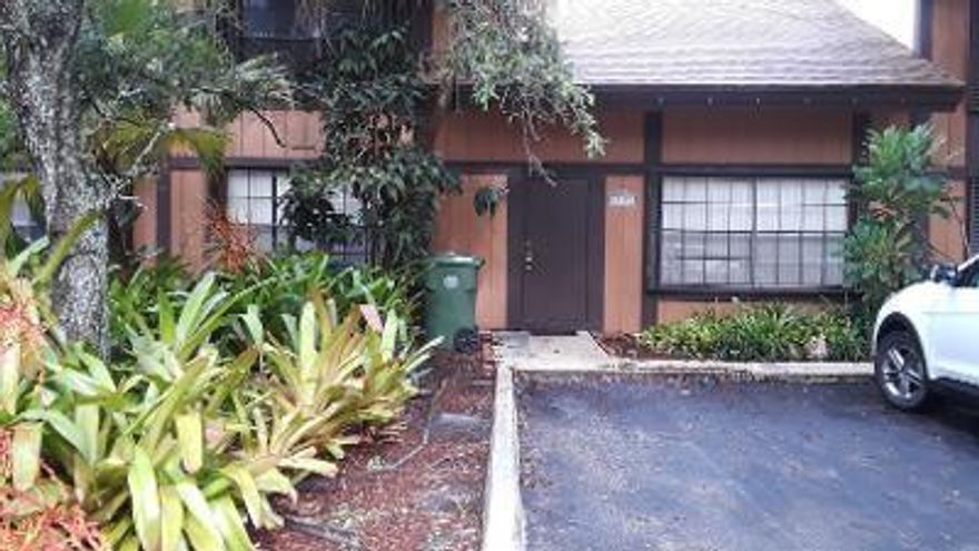 Rarely Available 3 bedroom 2 bath townhome with a HUGE Main bedroom upstairs and Huge loft in Cedarwoods community. New roof 2018,just painted 10/20,new carpet 10/20. a/c replaced.  Home has washer and dryer , an  outside fenced patio (pets welcome)!25 ft ceilings and accordian shutters. Two bedrooms on bottom floor..second floor is complete main bedroom suite and loft. Come see.. make an offer and make this home yours. No renting first two years dishwasher and garbage disposal do not work.  seller will give $ credit at closing for new appliances