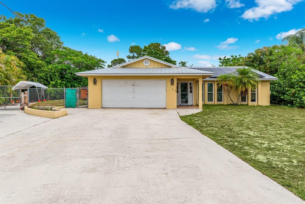 Photo of 1163 NW 16th Place, Stuart, FL 34994 (MLS # R10718996)