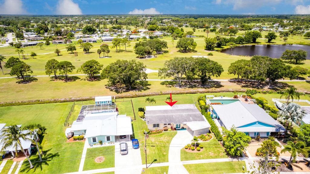 Photo of 2948 SE Treasure Island Road, Port St Lucie, FL 34952 (MLS # R10898056)