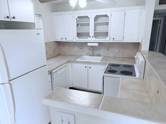 1st floor corner 2 bedroom,2 bath quiet Tilford location. Century Village offers the finest in amenities with its massive clubhouse featuring 1500+ seat theater. fitness center, ball room, card rooms, billiards, wood shop, stained glass shop, art workshops, clay room, table tennis, tennis, pickle ball, mini golf, heated pools, courtesy shuttle and so much more. You'll love this place!