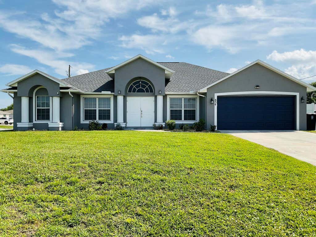 Photo of 854 SW Paar Drive, Port Saint Lucie, FL 34953 (MLS # R10970173)