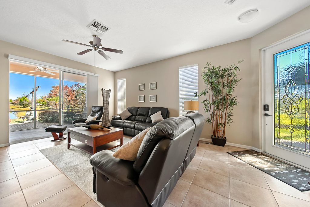 Photo of 9893 SW Eastbrook Circle, Port Saint Lucie, FL 34987 (MLS # R11163594)