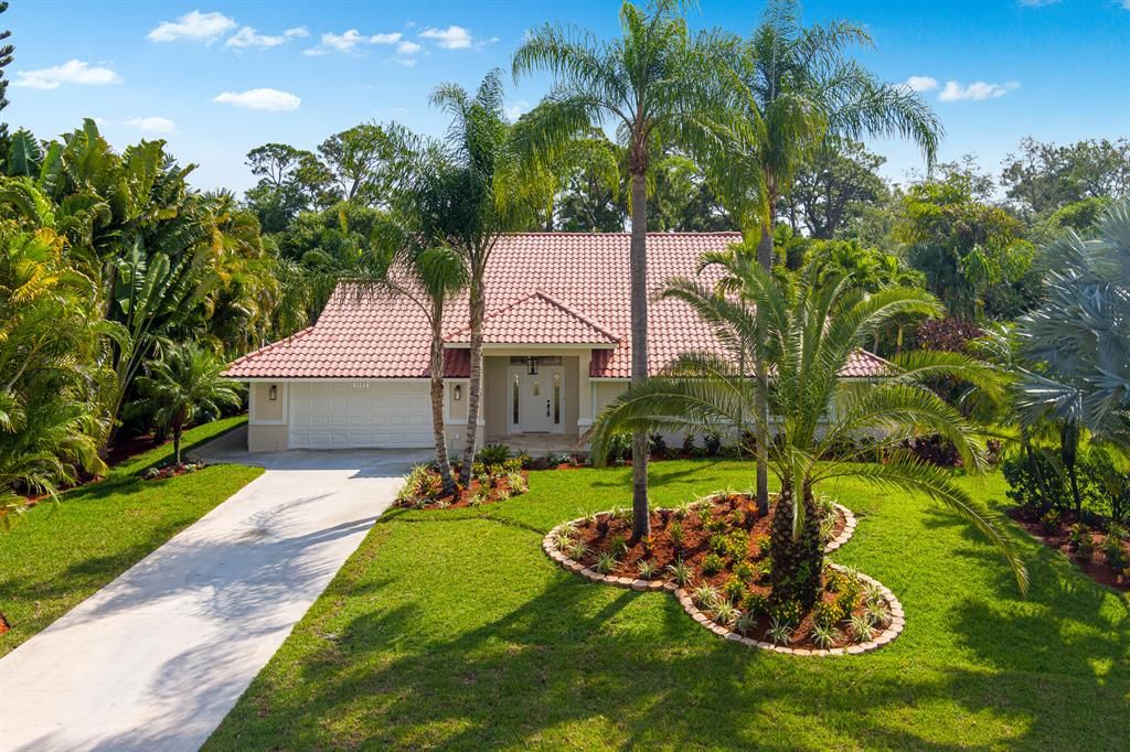 Photo of 5488 SW Landing Creek Drive, Palm City, FL 34990 (MLS # R10709059)