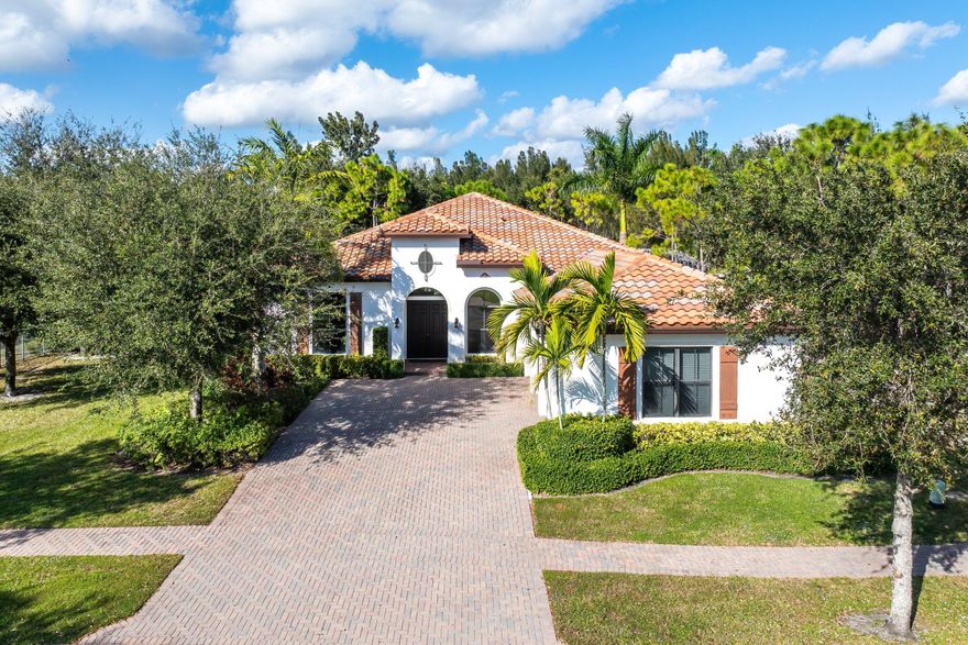 Your dream of effortless Florida living starts here! This 4 bedroom, 3 car garage, single story pool home is set on a large private lot in the highly sought after Osprey Oaks community.  The 3-way split floor plan offers over 3,000 sq ft of refined living space, soaring ceilings, and a layout that blends casual elegance with everyday comfort.

Step through the double door entry into an inviting atmosphere, filled with natural light and lined with 12 ft tray ceilings, 8 ft doors, crown molding, recessed lighting and beautifully framed windows. The unique, open concept 3 car garage Cypress floorplan model flows seamlessly into a chef inspired kitchen featuring two-tone cabinetry, a large center island, stainless steel appliances including a double oven, granite countertops, and a spacious pantry ideal for weekday meals or hosting a crowd.

The adjacent family room (currently used as a dining room) includes a convenient custom built in, a breakfast nook, and serene views of the sparkling pool and covered patio. 
A home that leaves truly nothing to be desired, your luxurious primary suite also offers a large separate sitting area, great for an in home office or gym, his and hers custom closets, and French doors leading to the backyard, while your spa inspired modern bathroom features a dual entry shower, soaking tub, separate vanities, and individual water closets. On the opposite wing of the home, 2 generously sized bedrooms share a Jack and Jill bath, while the den or additional bedroom, framed with French doors includes a built in bar with wine cooler and adjacent half bathroom!
When you are ready to enjoy the South Florida sun, step outside where you will enjoy a covered patio, fully fenced, private yard with neighbors on just one side, mature foliage, privacy and best of all a modern pool with sun shelf! The perfect blend of relaxation and entertaining space!

Additional notable features include a whole house 500 gallon Generac generator with underground propane tank, smart thermostats, cameras and smoke/CO detectors, full impact windows and doors, a new pool pump/filter, EV charging outlet and storage in the garage, gutter system, freshly painted interior, custom window treatments throughout the entire home and more!
Osprey Oaks is an intimate, gated community with 171 homes, offering resort style amenities including a clubhouse, fitness center, pool and spa, green space, sidewalks, dog park, and peaceful preserves. With unbeatable access to daily conveniences, top rated schools, dining, golf, country clubs, shopping, and both I-95 and the Forida Turnpike. If you are looking for a turn key home that checks all the boxes, reach out for your private showing today!