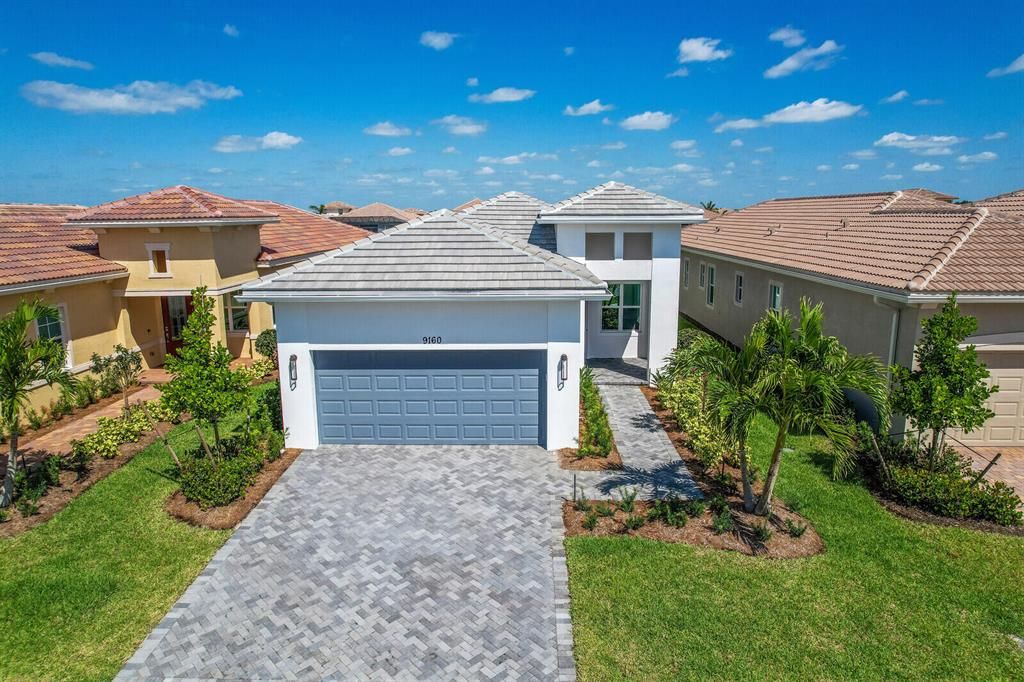 Photo of 9160 SW Michele Way, Port St Lucie, FL 34986 (MLS # R10887041)