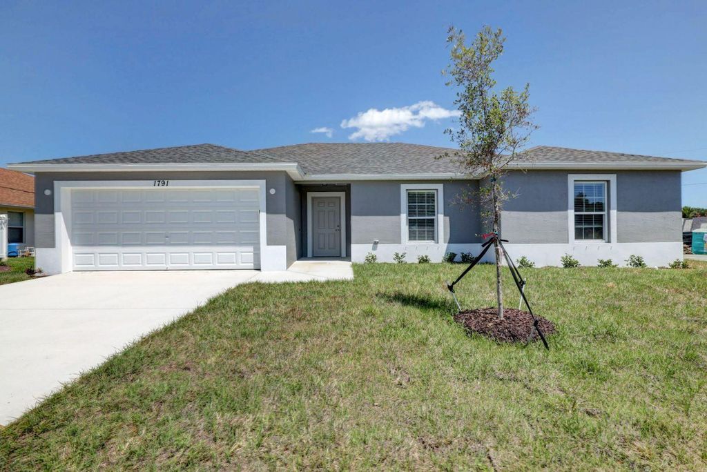 Photo of 1337 SW Vicuna Lane, Port Saint Lucie, FL 34953 (MLS # R10978864)