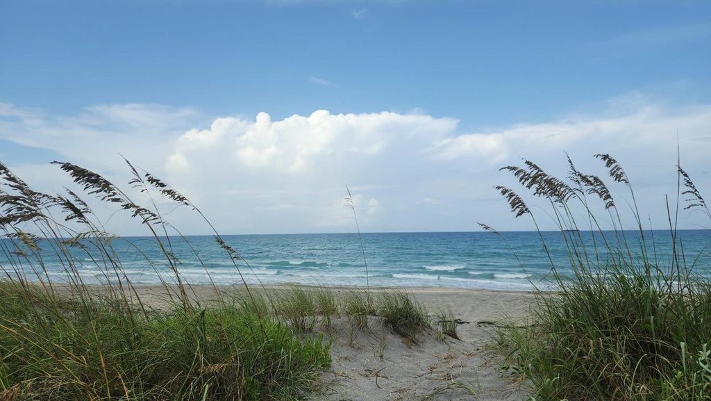 Photo of 115 Olympus Way, Jupiter, FL 33477 (MLS # R11155401)