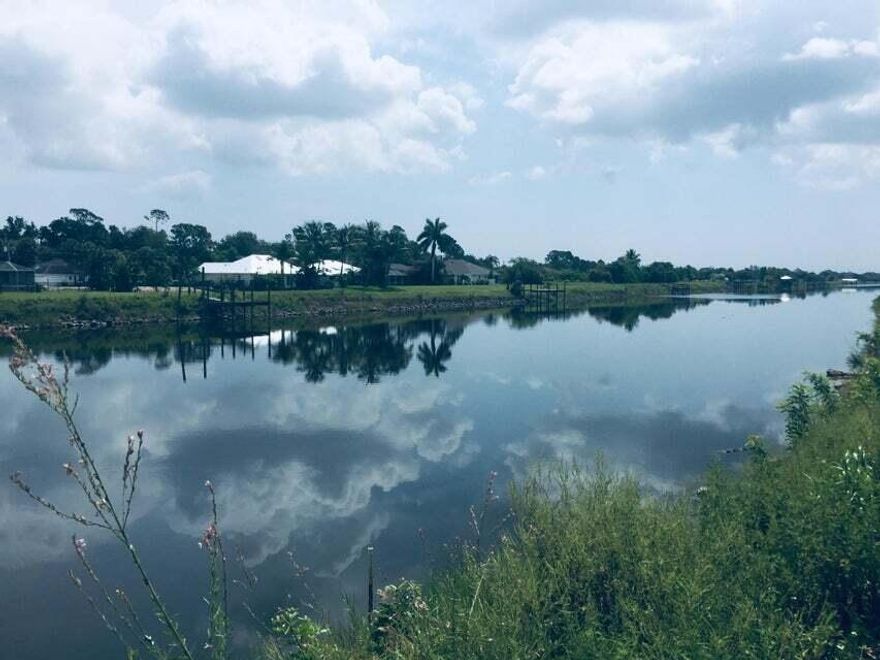 BEAUTIFUL WATER LOT ON C 24.  GET APPROVAL TO BUILD YOUR OWN DOCK.  FRESH WATER FISHING, MOTARIZED BOATING PERMITTED, JET SKIS,CANOES AND KAYAKS.  SHOPS AND RESTAURANTS NEARBY.  BUILD YOUR DREAM HOME ON THE WATER.
