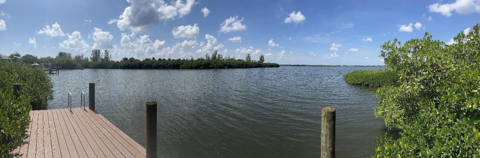 Beautiful waterfront vacant lot with large oak trees and west facing dock! Enjoy the sunsets on the dock and the abundance of wildlife. Plenty of preliminary architectural and engineering work has already been done for the construction of a 4,025 ft. single family house, including the permit for the septic field. The owner is offering all of this paperwork included in the price. If you like the project, you can take the existing drawings and move quickly into permitting, or you can take the concept of what can be built on the site and adjust it to your own liking. Cash or OWNER FINANCING considered. Photos are renderings of the home that can be built on the lot.