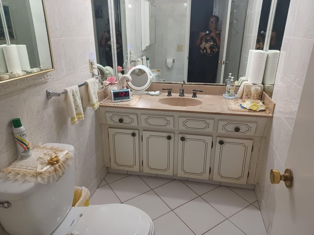 Photo of 4090 NW 42nd Ave #303, Lauderdale Lakes, FL 33319 (MLS # F10494776)