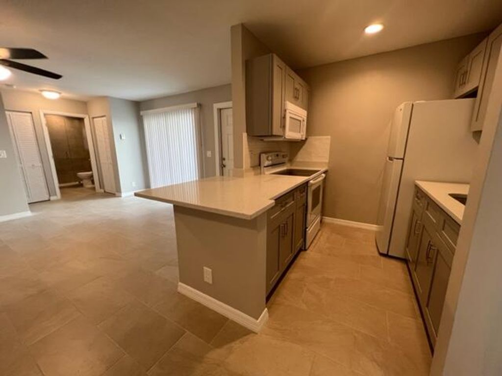 Photo of 24 Crossings Circle #B, Boynton Beach, FL 33435 (MLS # R11028840)
