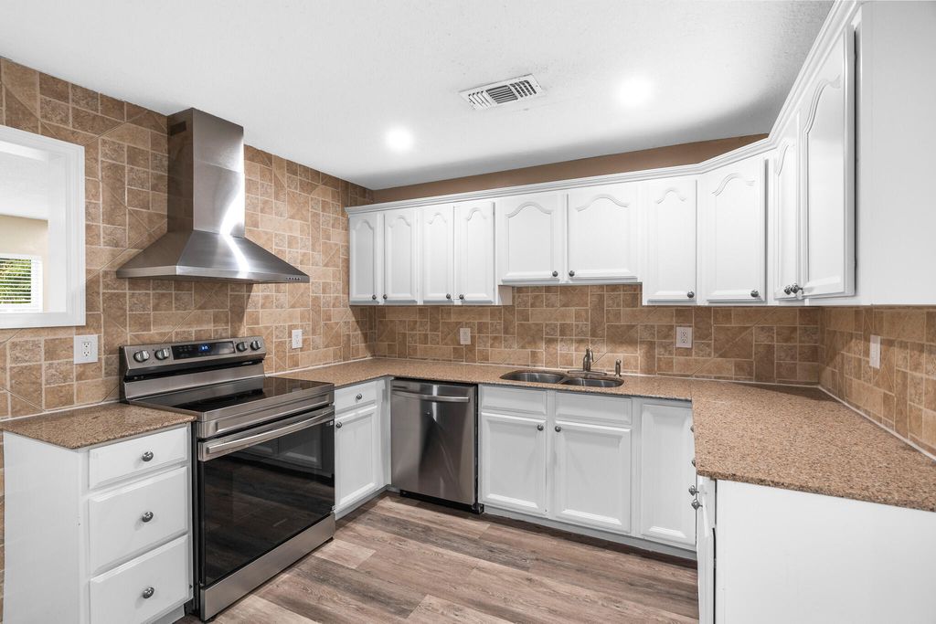 Photo of 3201 Alice Drive, Palm Springs, FL 33461 (MLS # B26030983)