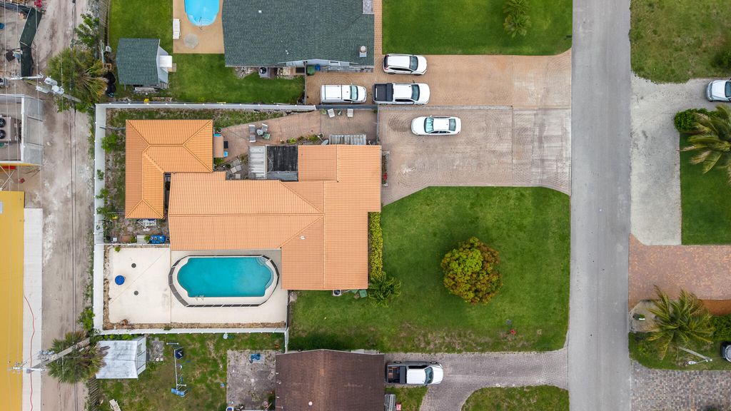 Photo of 3201 Alice Drive, Palm Springs, FL 33461 (MLS # B26030983)