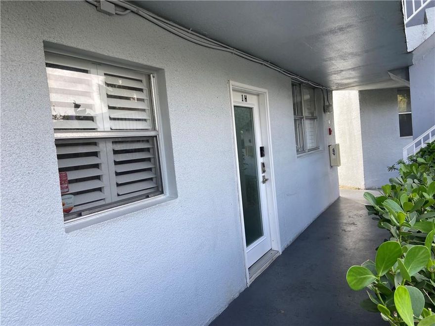 Gated well-kept community with a pool, gym, library, ping ping, and pool table in clubhouse a few feet away. Estate shutters and 24x24 tiles throughout and 3 barn doors. Basic cable included in maintenance which includes a DVR and 3 cable boxes. Storage is also included and only a few feet away in outside room. Royal Palm Park, Stunson nature trail, and Easterlin Park are direct neighbors. The former has free tennis and racquetball courts. The condos are surrounded by canals on almost all areas, the view of this apartment is a lawn not water and the clubhouse to the right. Cats in apartment so if allergic, be warned. Tankless Water Heater.