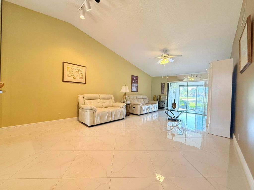 Photo of 809 Sky Pine Way #F, Greenacres, FL 33415 (MLS # B26006034)