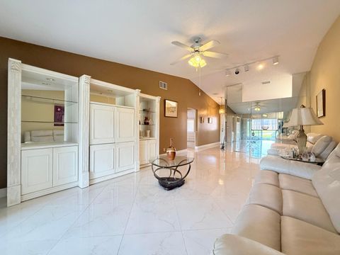 Photo of 809 Sky Pine Way #F, Greenacres, FL 33415 (MLS # B26006034)