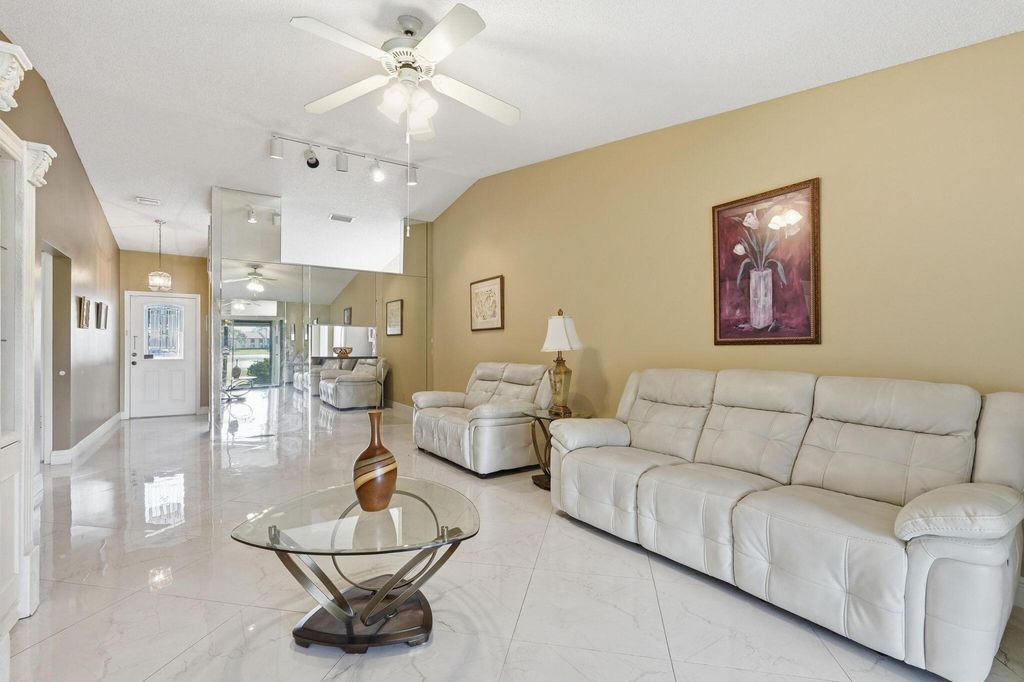Photo of 809 Sky Pine Way #F, Greenacres, FL 33415 (MLS # B26006034)