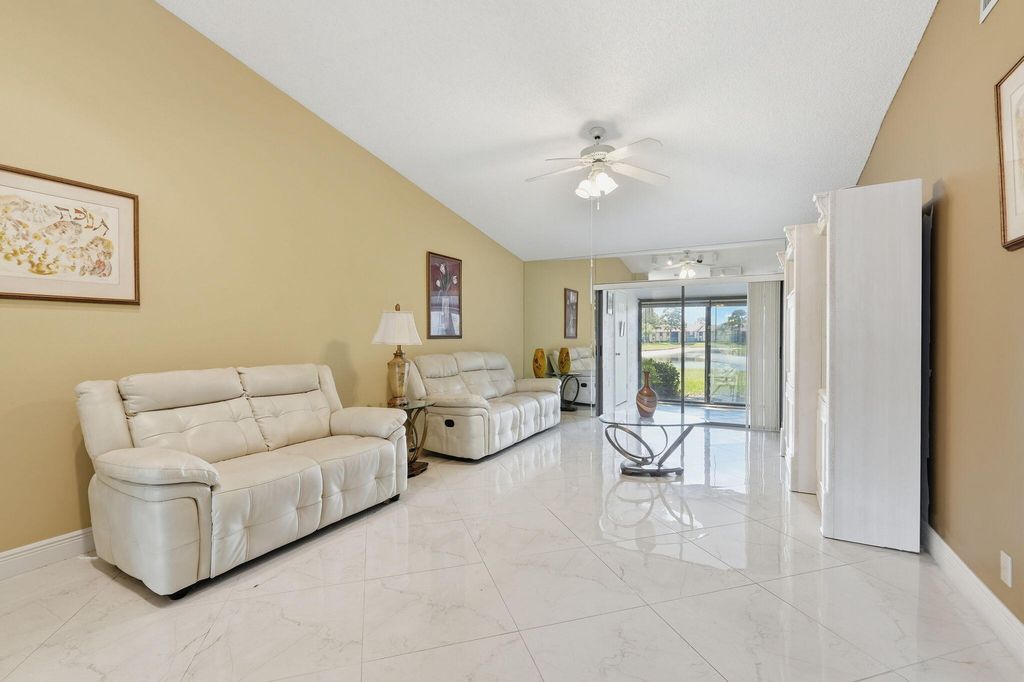 Photo of 809 Sky Pine Way #F, Greenacres, FL 33415 (MLS # B26006034)