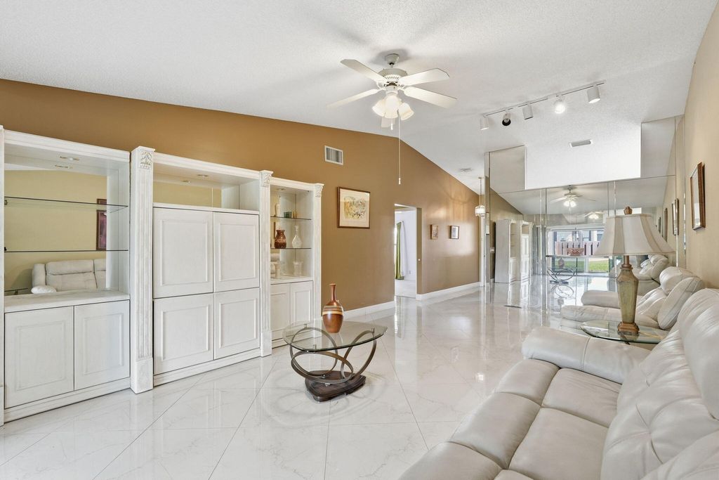 Photo of 809 Sky Pine Way #F, Greenacres, FL 33415 (MLS # B26006034)