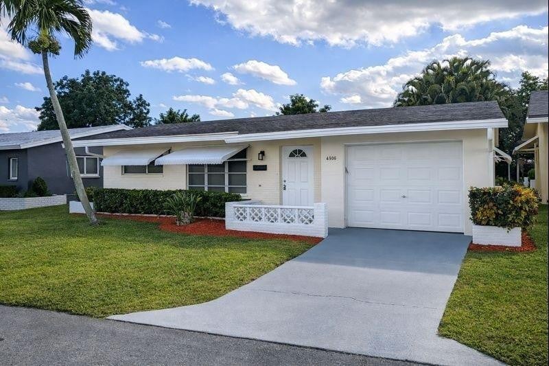 Photo of 4906 NW 53RD Court, Tamarac, FL 33319 (MLS # B26070723)
