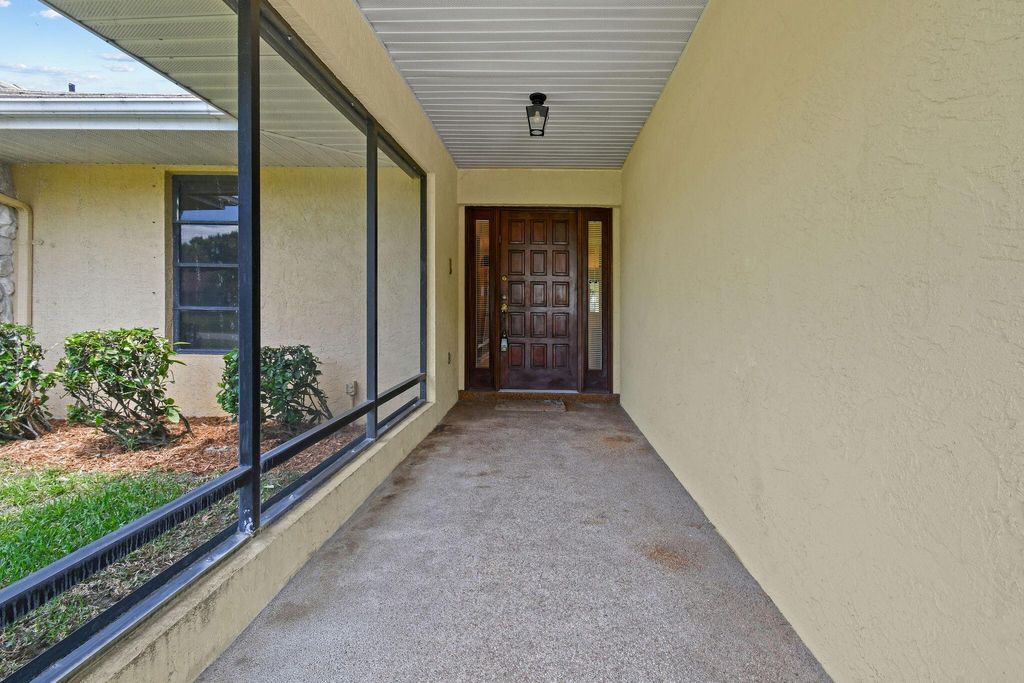 Photo of 2961 SE Farley Road, Port Saint Lucie, FL 34952 (MLS # R11108245)
