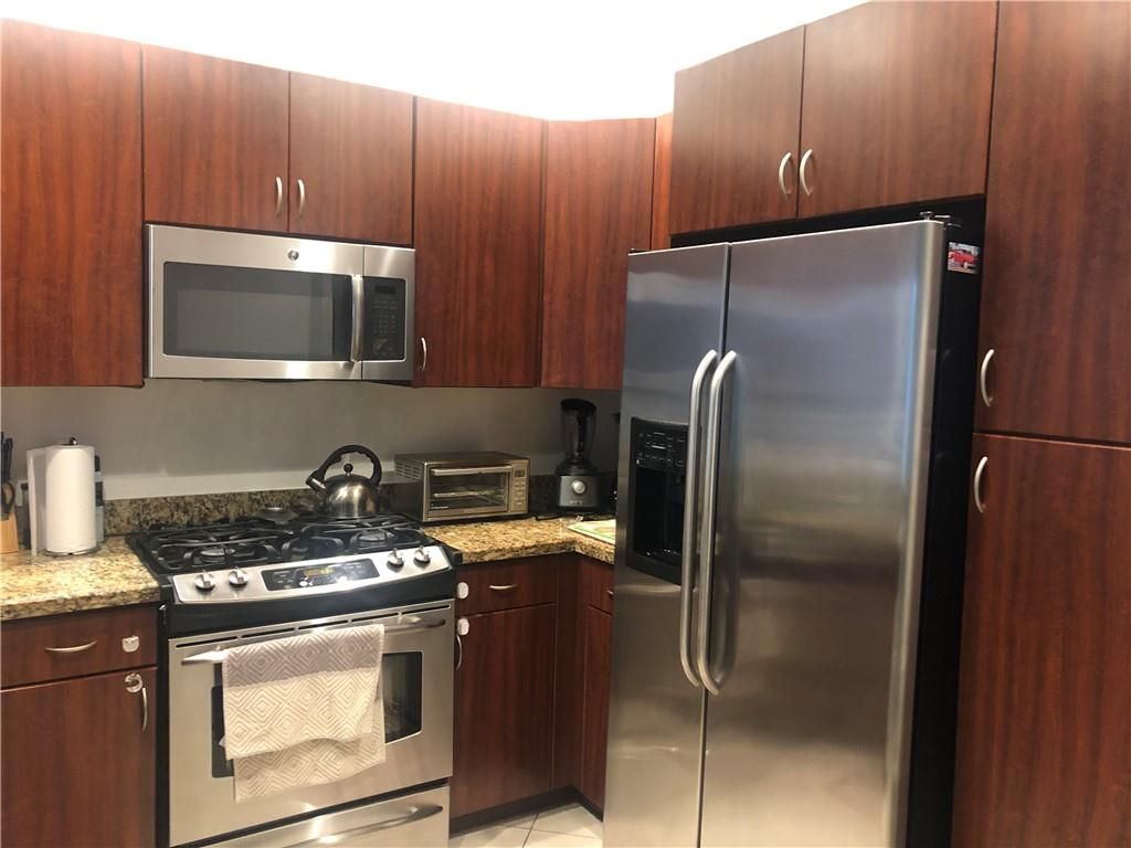 Photo of 3020 NW 125th Ave #315, Sunrise, FL 33323 (MLS # F10292897)