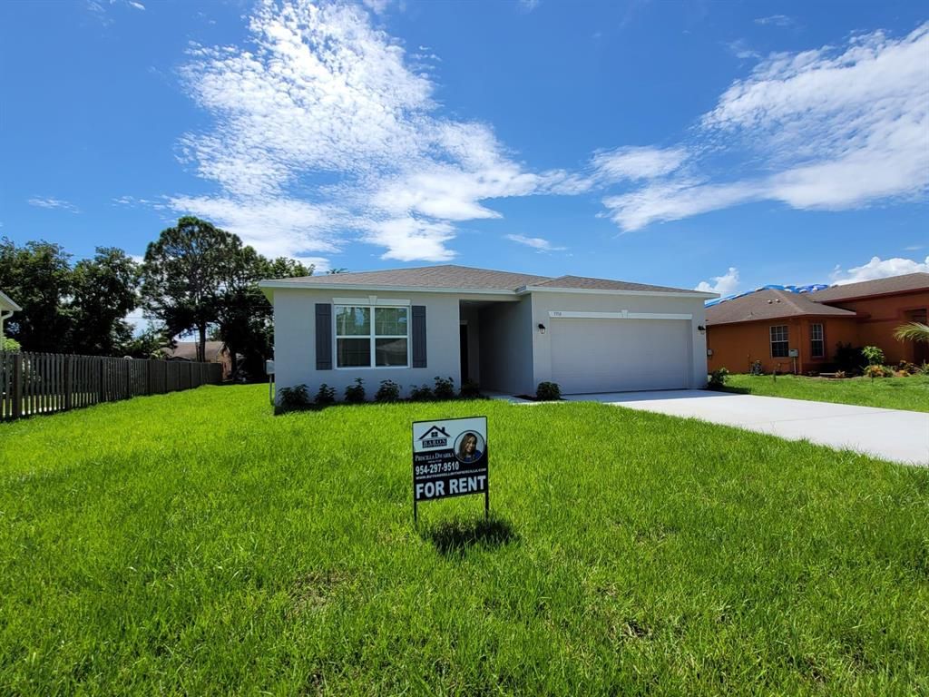 Photo of 3350 SW Vendome Street, Port Saint Lucie, FL 34953 (MLS # R10735799)