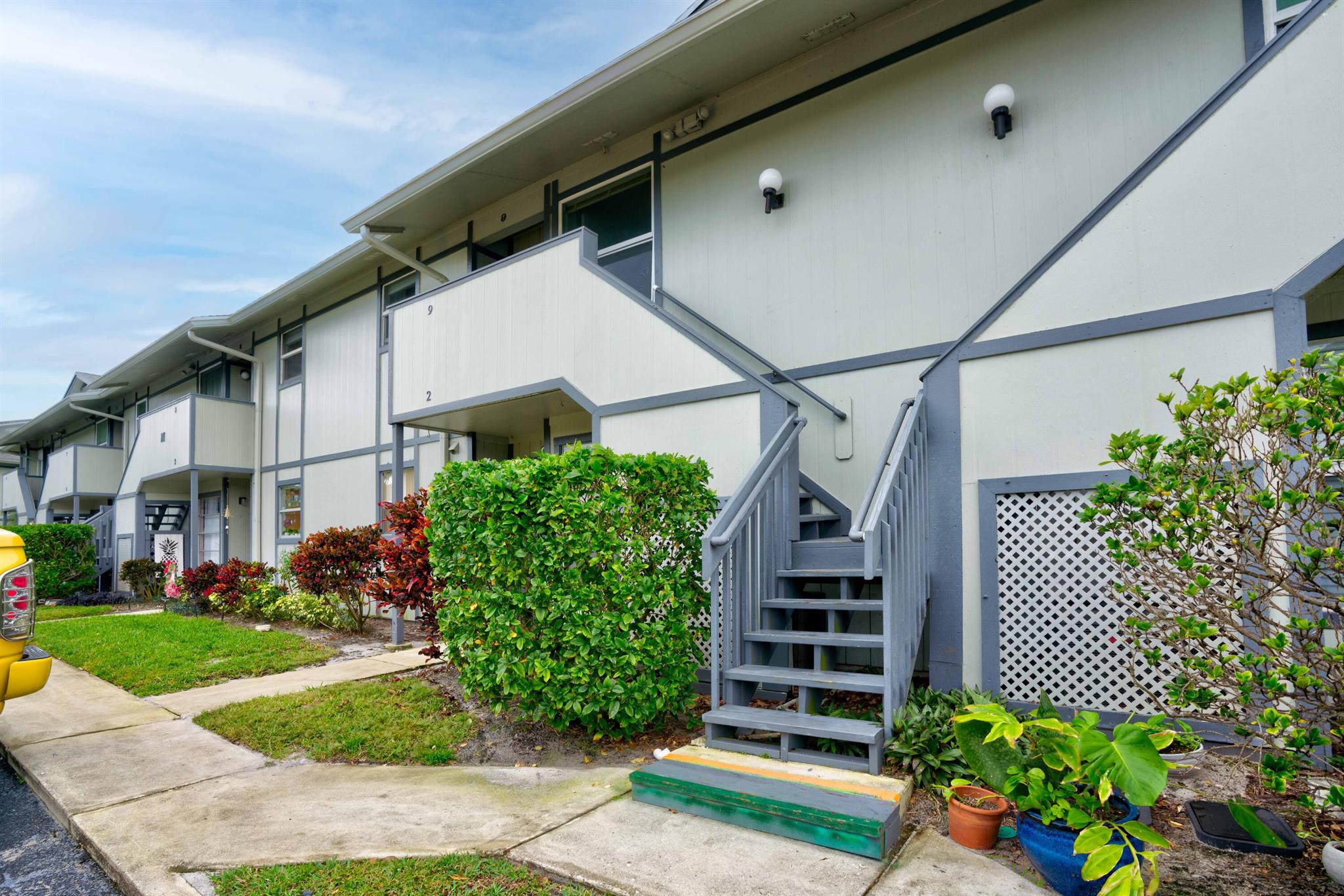 A VERY SPACIOUS BRIGHT UNIT IN PINE CROFT WITH A WORKING FIRE PLACE! CATHEDRAL CEILINGS, SKY LIGHTS, QUARTZ COUNTER TOPS. ALL NEWER APPLIANCES (2024-2025) RANGE, FRIDGE, MICROWAVE AND DISHWASHER. NEW A.C. IMPACT WINDOWS THROUGHOUT. PINE CROFT IS A BEAUTIFUL LANDSCAPED COMMUNITY WITH A POOL AND SMALL CLUB HOUSE, BUTTERFLY GARDEN,AND A PIC-NIC GRILLING AREA. COME HOME TO A PEACEFUL QUIET LENAI LOOKING OUT ONTO A SERENE POND AND PRESERVE. THE UNIT IS AN ENTERTAINERS DELIGHT, WITH AMPLE SPACE FOR A DINNING TABLE, FIRE PLACE AND LENAI! PINE CROFT IS CLOSE TO ALL SHOPS, RESTAURANTS, AND BEAUTIFUL HOBE SOUND BEACH!