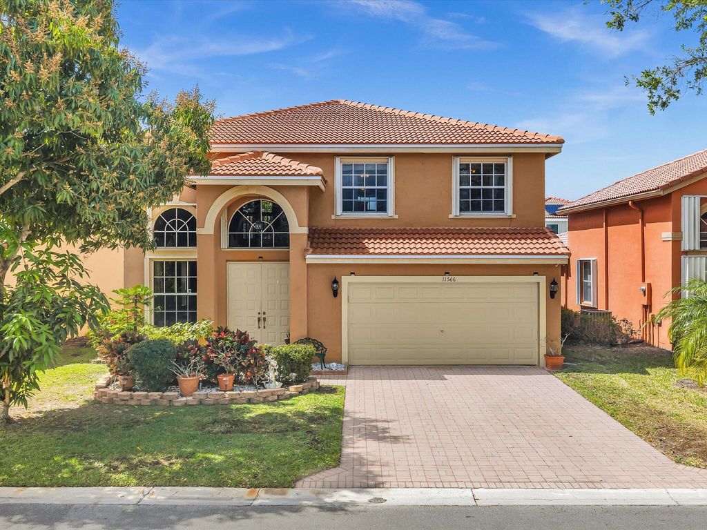 Photo of 11566 NW 5th Street, Coral Springs, FL 33071 (MLS # B26003808)
