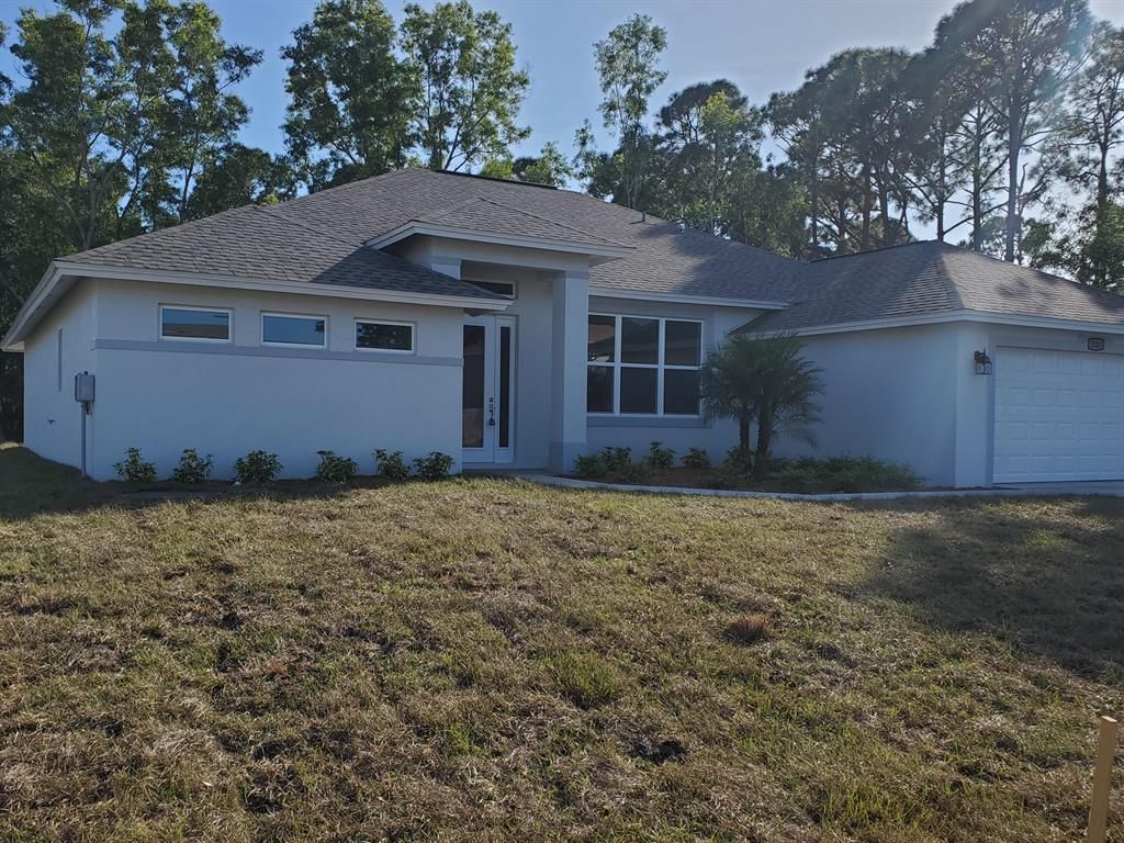 Photo of 4617 SW Savona Boulevard, Port Saint Lucie, FL 34953 (MLS # R10718153)