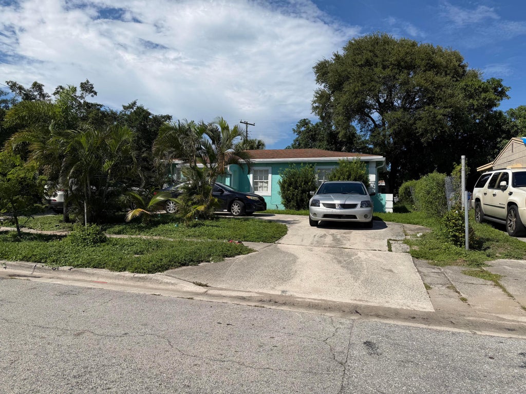 Photo of 386 W 15TH Street, Riviera Beach, FL 33404 (MLS # B26089626)