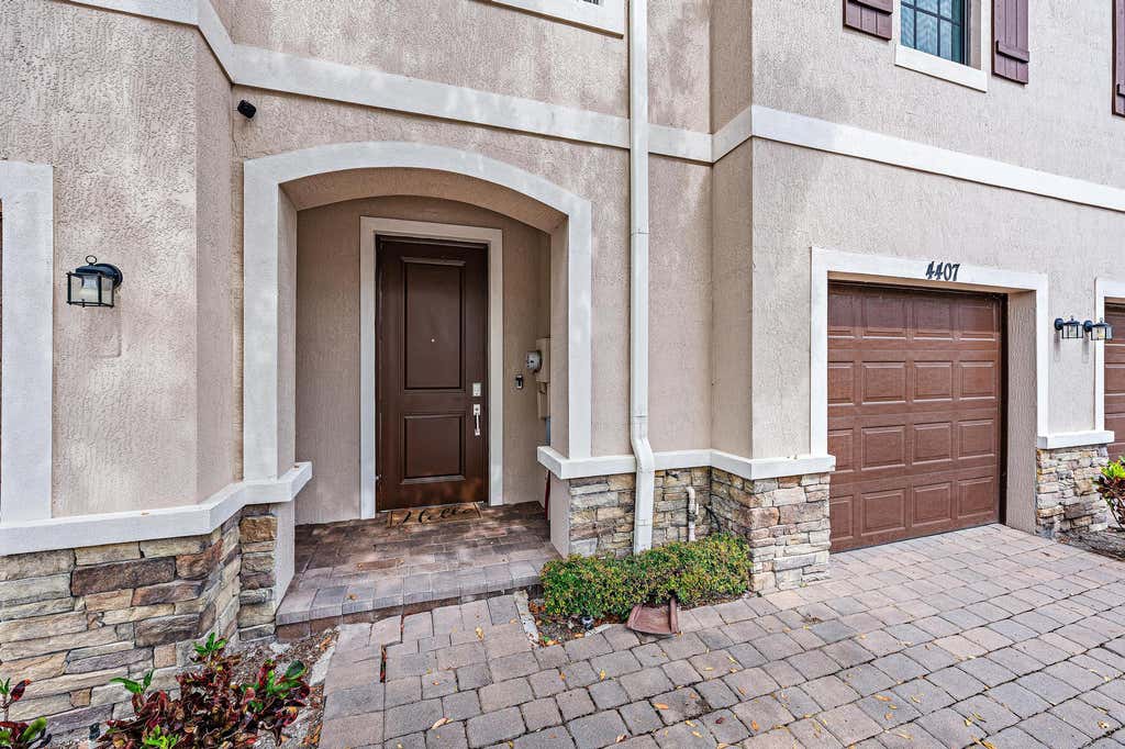 Photo of 4407 Hemlock Drive, Riviera Beach, FL 33410 (MLS # B26036366)