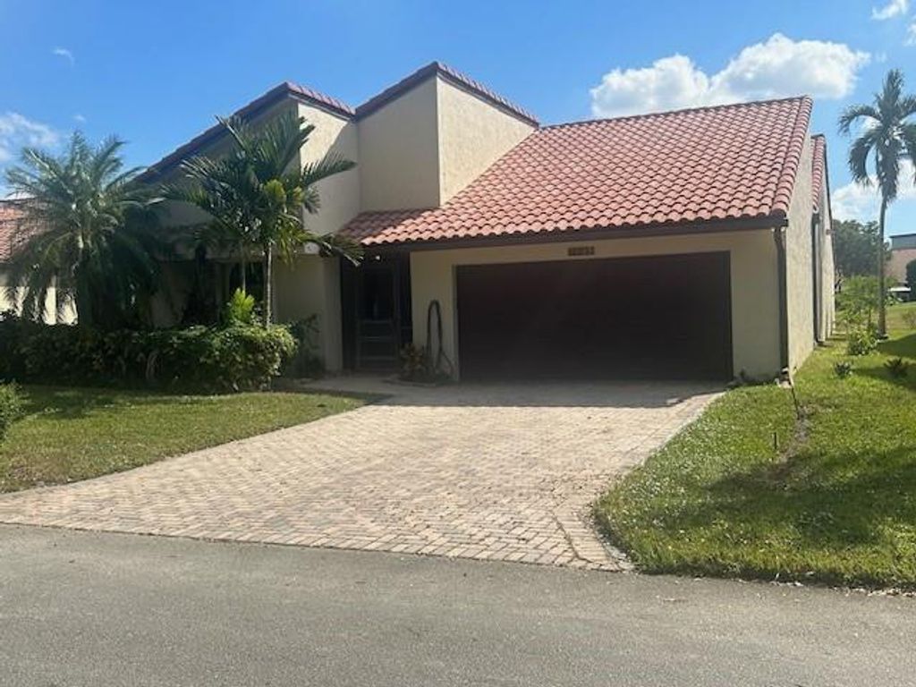 Photo of 7009 Golf Pointe Circle, Tamarac, FL 33321 (MLS # F10537095)