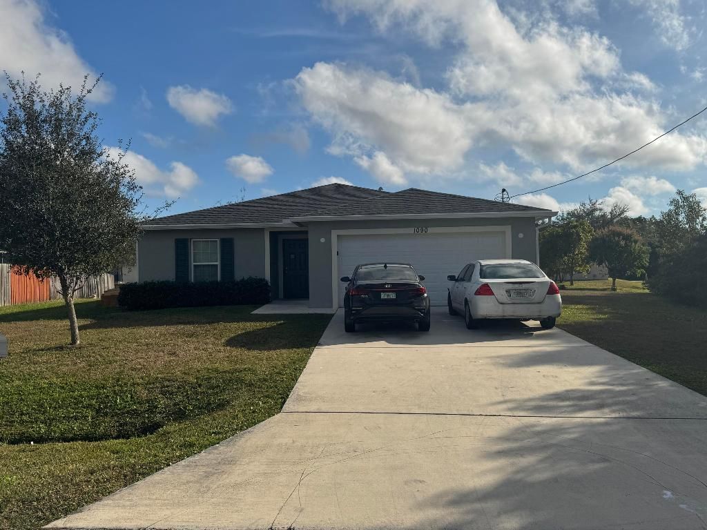 Photo of 1090 SW Estaugh Avenue, Port Saint Lucie, FL 34953 (MLS # R11151739)