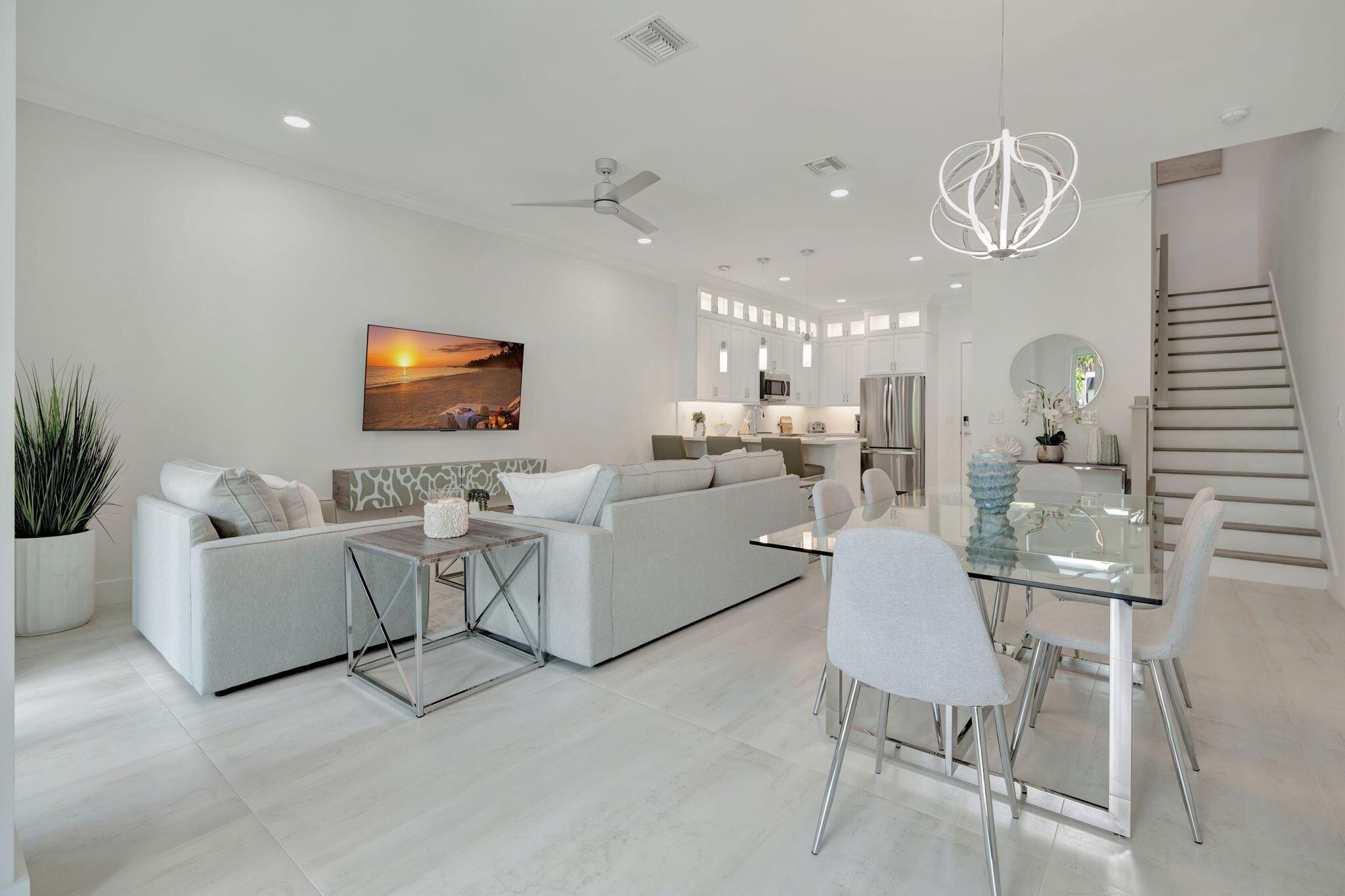 Brand New Luxury Waterfront Townhome for rent in Stuart, FL Dock slip with boat lift that will accommodate a 30ft boat available for an additional $500 per month. Welcome to the ultimate South Florida boating lifestyle where luxury, convenience, and adventure meet. These new coastal-inspired townhomes are designed for the discerning buyer who wants instant access to the water and all the fun it brings. Imagine stepping outside your door, hopping on your boat, and cruising to the Stuart Sandbar, waterfront restaurants, or world-class fishing within minutes. These 3 bedroom, 2.5 bath homes feature custom cabinets, quartz countertops, large format porcelain tile on 1st floor, luxury vinyl plank on 2nd floor, frame-less glass showers, designer inspired shower tile and mosaic
