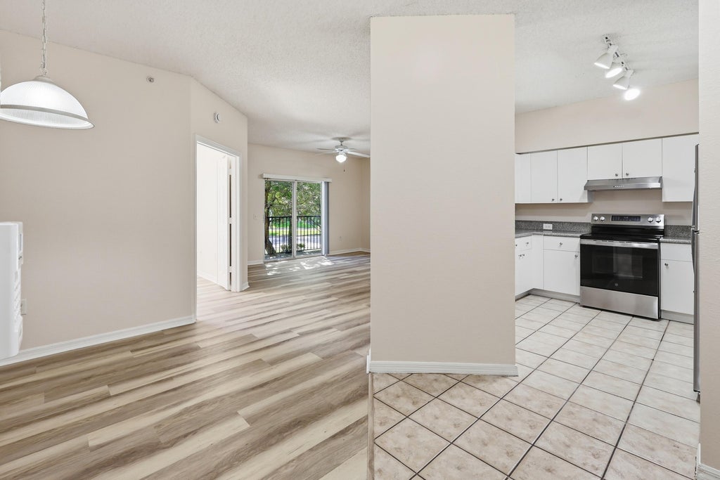 Photo of 350 CRESTWOOD Circle #201, Royal Palm Beach, FL 33411 (MLS # B26054843)