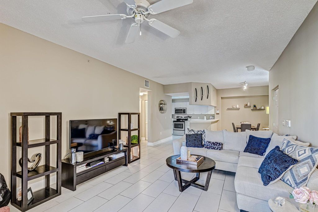 Photo of 3019 Alcazar Place #206, Palm Beach Gardens, FL 33410 (MLS # R10966814)