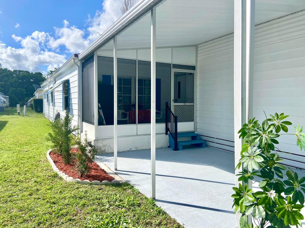 Photo of 52 Camino Del Rio, Port Saint Lucie, FL 34952 (MLS # R11061908)